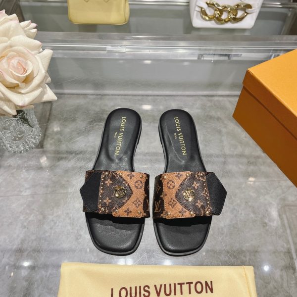 Louis Vuitton studded slippers black